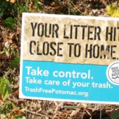 Anti litter sign in the woods. Photo by Will Schick